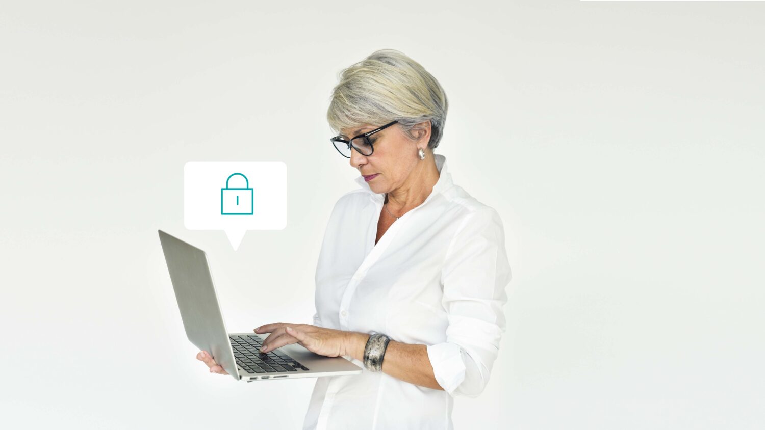 Elderly woman using a laptop